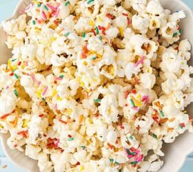 the best cinnamon sugar oyster crackers recipe, Colorful funfetti popcorn clusters served in a bowl with rainbow sprinkles on top