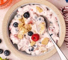 easy 4th of july cheesecake fruit salad no marshmallows needed, Patriotic red white and blue fruit salad with creamy dressing served in a bowl for summer party