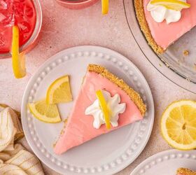 the only no bake pink lemonade pie you ll ever need, Bright and airy shot of a pink lemonade pie with whipped cream topping on a clean white background