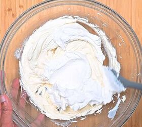 easy red white and blue funfetti cake dip recipe, Whipped topping being gently folded into creamy funfetti cake dip mixture to create a light and airy texture