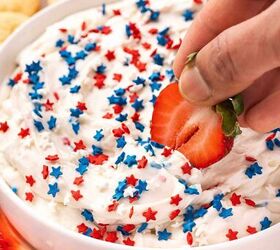 easy red white and blue funfetti cake dip recipe, Fresh strawberry dipped into creamy red white and blue funfetti cake dip topped with sprinkles for a patriotic 4th of July dessert bite