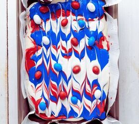 red white and blue chocolate bark, Sprinkle red white and blue star sprinkles and M Ms over the top while the candy melts