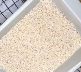 viral stick of butter rice easy baked butter rice recipe, Rinsed white rice in a white baking dish