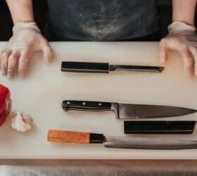 how to make udon noodles in less than 30 minutes quick easy recipe, Gloved hands preparing to chop with knives on a cutting board next to vegetables in a kitchen scene