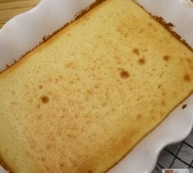 dot cakes easy viral mini dot cake recipe, A white baking pan with a vanilla cake baked inside