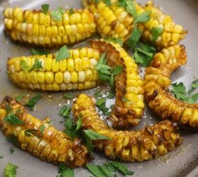 cajun butter corn ribs easy cajun corn ribs recipe, Cajun Butter Corn Ribs garnished with parsley and lemon juice