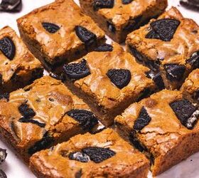 the best oreo blondies fudgy chewy and loaded with cookies, Twelve Oreo blondies on the counter