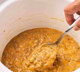easy slow cooker hamburger velveeta dip 5 ingredients no fuss, Spoonful of velveeta dip with ground beef in the slow cooker