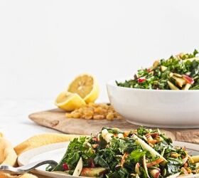 easy kale apple salad with lemon miso dressing, Plate of kale apple salad with crisp apples carrots radishes and pumpkin seeds dressed in lemon miso dressing