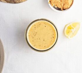 easy kale apple salad with lemon miso dressing, Creamy homemade lemon miso dressing in a glass jar with miso paste and fresh lemon