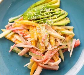 easy kale apple salad with lemon miso dressing, Spicy crab salad with shredded imitation crab cucumber and mango topped with sliced avocado and sesame seeds in a blue plate