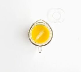 easy kale apple salad with lemon miso dressing, Smooth lemon miso dressing mixed in a glass measuring cup