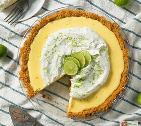 key lime pie recipe homemade key lime pie, Overhead image of a key lime pie with a slice taken out of it