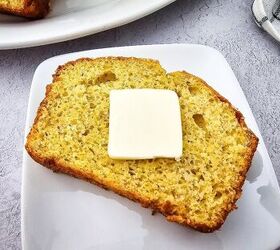 easy banana bread using yellow cake mix recipe, Slice of banana bread made with yellow cake mix topped with butter and ready to enjoy