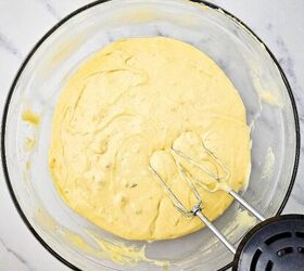 easy banana bread using yellow cake mix recipe, Banana bread batter mixed until smooth with an electric hand mixer in a glass bowl