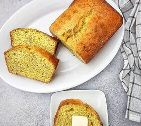 easy banana bread using yellow cake mix recipe, Freshly baked banana bread made with yellow cake mix served with sliced loaf and a buttered slice on white plates