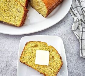 easy banana bread using yellow cake mix recipe, Banana bread made with yellow cake mix with a buttered slice served alongside the baked loaf