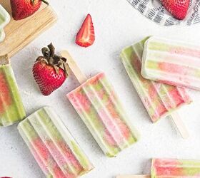 homemade matcha popsicles with strawberry layers, Overhead view of matcha strawberry popsicles arranged with fresh strawberries and matcha powder