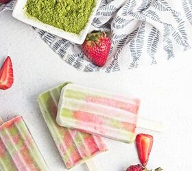 homemade matcha popsicles with strawberry layers, Matcha strawberry popsicles beside fresh strawberries and a dish of matcha powder
