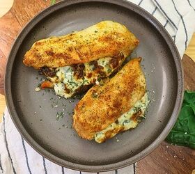 air fryer stuffed chicken spinach cream cheese stuffed chicken, Overhead image of air fryer stuffed chicken breasts on a plate