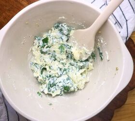air fryer stuffed chicken spinach cream cheese stuffed chicken, Cream cheese and spinach filling mixed in a bowl