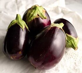sweet eggplant pistachio quick bread, Four eggplants on a Battenburg cloth