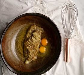 sweet eggplant pistachio quick bread, Pottery bowl with eggplant oil eggs and vanilla with a copper handled whisk beside to mix with