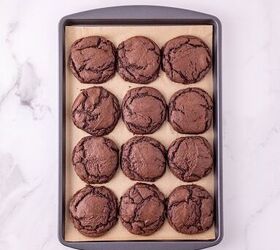 oreo bat cookies made with cake mix and reese s cups, Freshly baked chocolate cake mix cookies cooling on a parchment lined baking sheet