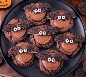 rice krispie turkey leg treats using pretzel bones, Oreo bat cookies topped with Reese s peanut butter cups Oreo wings and candy eyes on a black plate
